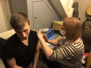 Polish man getting his covid vaccine